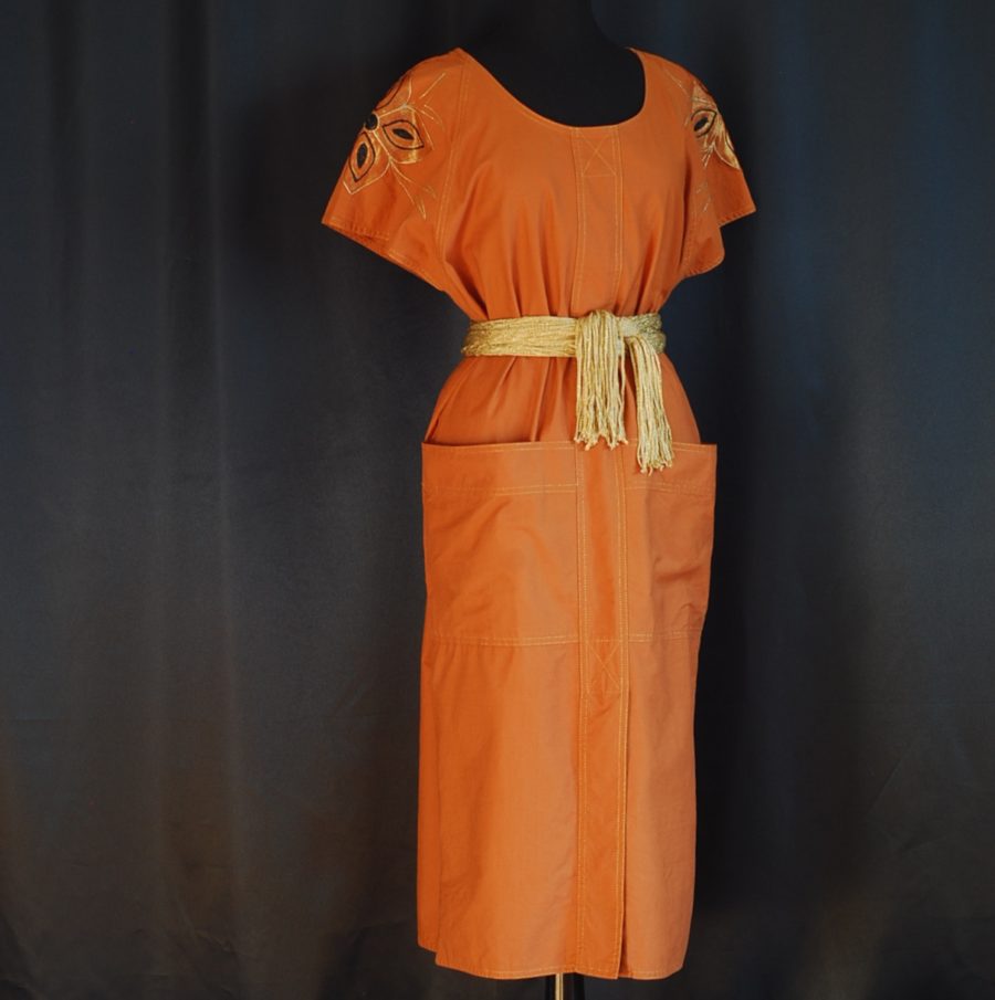 Morly's 1981 ochre coloured, embroidered shift dress with big front pockets, made in Italy.