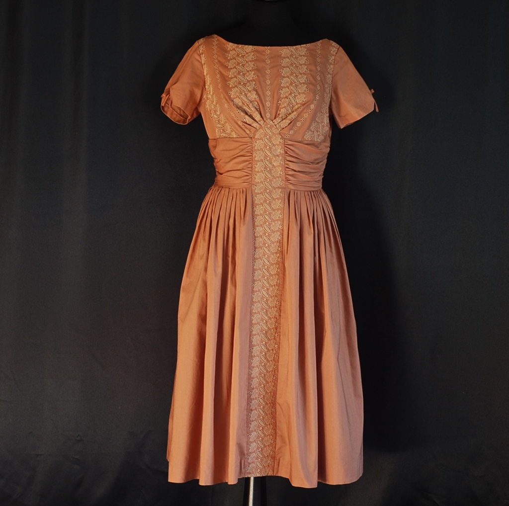 Leo-Danal embroidered, cotton, fawn coloured 1950's dress, made in Canada.