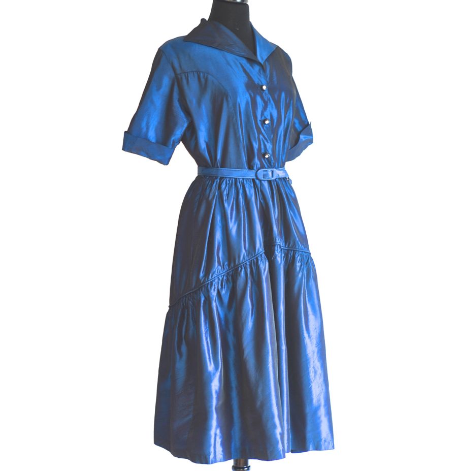 1940's vivid midnight blue taffeta dress with tiered skirt and rhinestone centred buttons.
