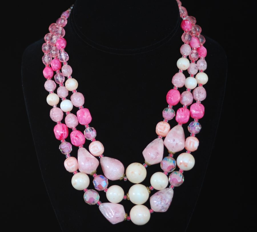 1960's pink multi strand lucite andthree strand pink lucite and glass bead necklace, signed made in West Germany