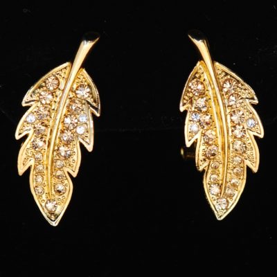 Gold tone leaf earrings with pave crystals product J193
