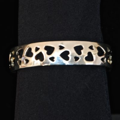 Sterling silver bracelet with cut out hearts