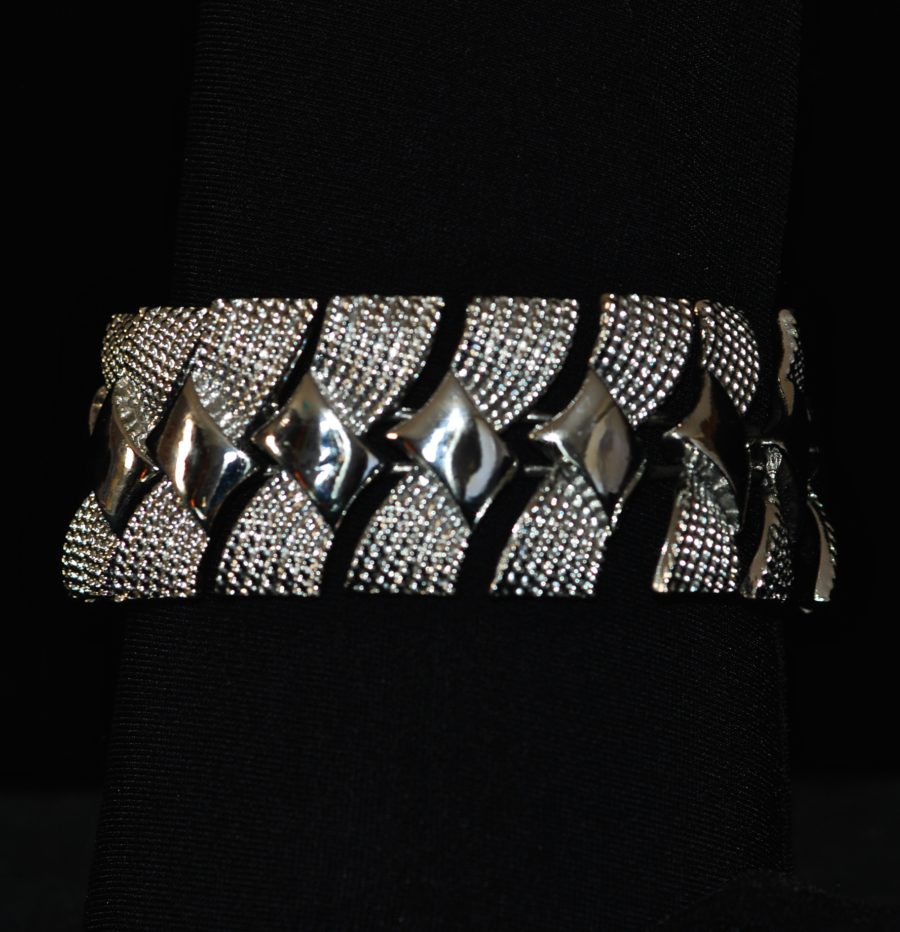 Coro 1940's Bracelet With rows of bows in silver tone textured metal