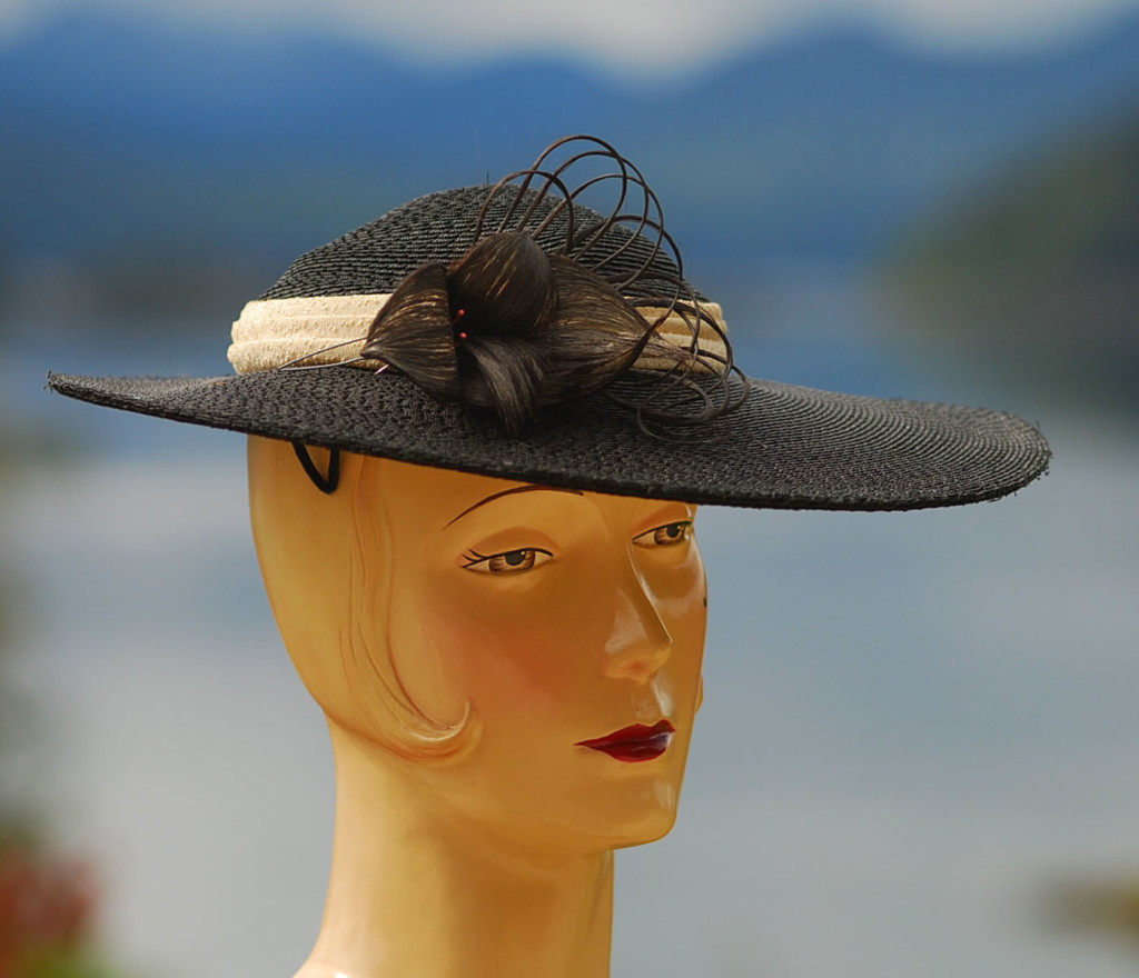 vintage hat with human hair accent and bokeh ocean view