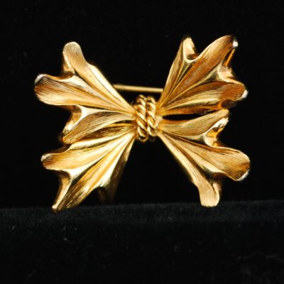 Grosse 1966 Textured Metal Bow Pin - Signed