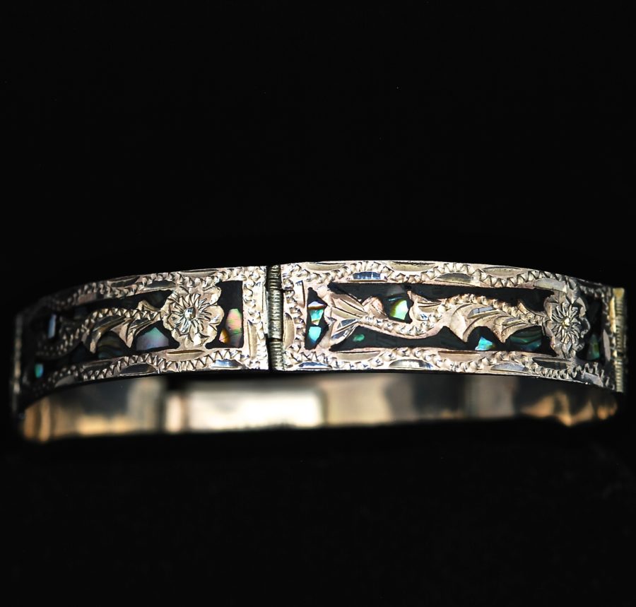 Taxco Intricately carved sterling silver bracelet with abalone inlay, made in Mexico