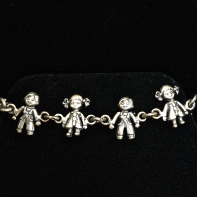 Children holding hands sterling silver bracelet