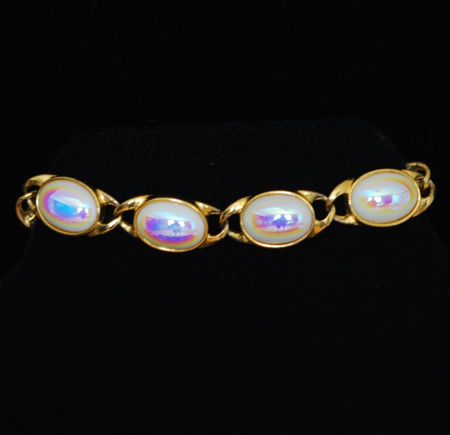 Galbani vintage bracelet with glowing white cabochons, signed
