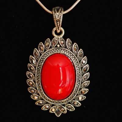 Marcasite Encircled Pendant With Red Cabochon Gemstone