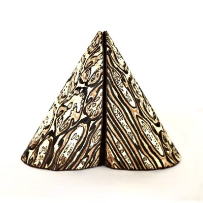 Shoe Shaped Wooden Book Ends Featuring An Intricate Textured Pattern