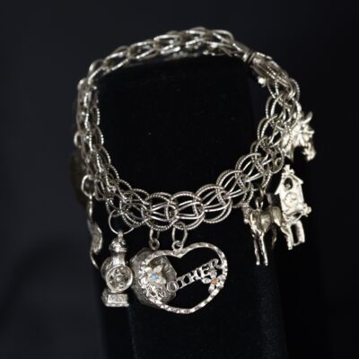 Sterling Silver 1970's Charm Bracelet With Twelve Charms - Stamp Sterling